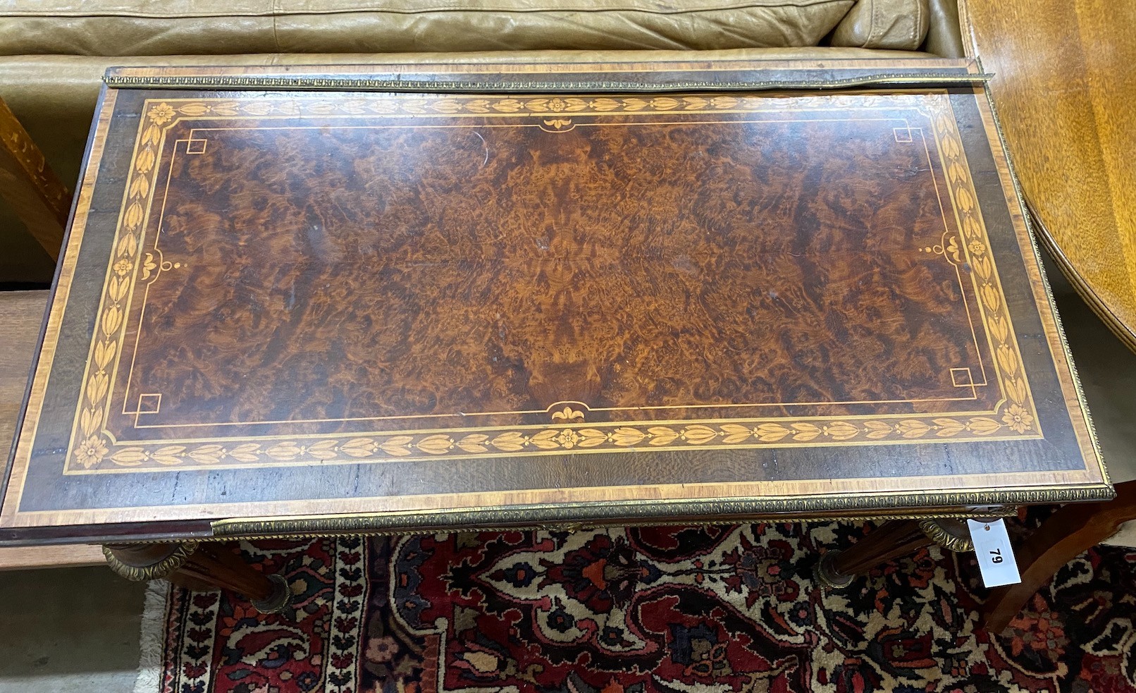 A French gilt metal mounted inlaid Thuya folding card table, width 87cm, depth 55cm, height 74cm